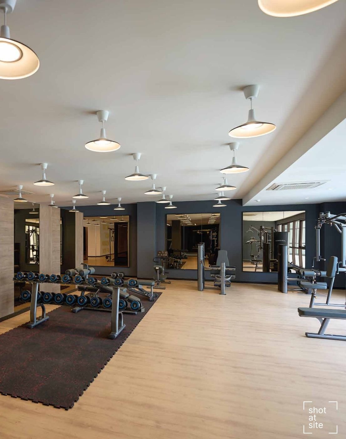 Fitness station with equipment
